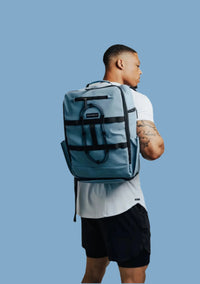 Carolina Blue Ai1 Turtle Shell backpack by BodCraft, leather-finish outer layers, 18.5 by 12 by 8 inches