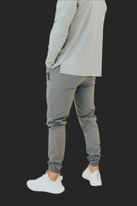 Side view of Storm Grey golf joggers showing the tapered leg and ankle cuff