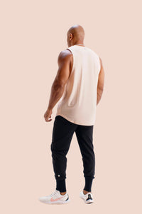 Faded Rose sleeveless gym shirt by BodCraft, showing the scalloped hem detail
