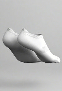 White Explosion ankle socks floating, heel tab logo visible