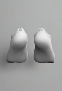 Back view of white Explosion socks showing the BodCraft heel tabs
