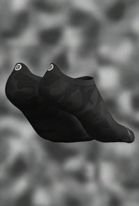 Black camo Explosion socks showing the heel tab logo