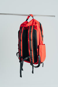 Back of the Kingdom Red Ai1 backpack showing black padded shoulder straps
