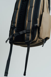 Close-up of the padded back and shoulder straps on the Olive Ai1 backpack