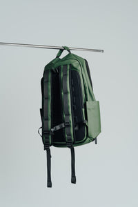 Army Green Ai1 backpack from behind, showing the padded back panel and straps