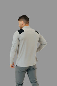 Rear three-quarter view of the Ghost Grey/Black long sleeve golf shirt