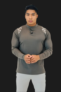 Front view of the Storm Grey/Camo men's long sleeve golf shirt with button placket