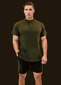 Front view of the Seaweed Green men's golf shirt with stand collar and button placket