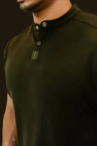 Close-up of the collar and two-button placket on the Seaweed Green golf shirt