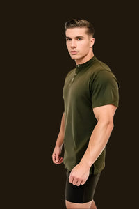 Seaweed Green short sleeve golf shirt with black shorts, three-quarter view