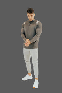 Ghost Grey golf joggers styled with a Storm Grey/Camo long sleeve golf shirt