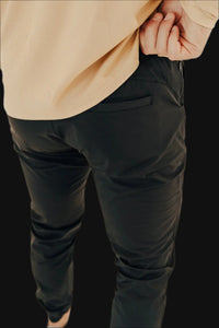 Close-up of the back pocket on Midnight Black golf joggers