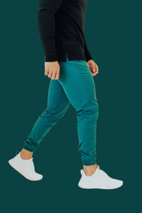 Pine Green golf joggers walking shot from the waist down