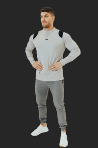 Full-length look: Ghost Grey/Black long sleeve golf shirt with Storm Grey golf joggers
