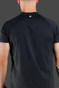 Back of a Shadow Grey short sleeve gym shirt showing the neckline logo tab