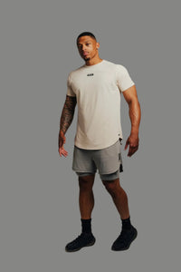 Full-length front view of Ghost Grey 2-in-1 training shorts with a curved-hem tee
