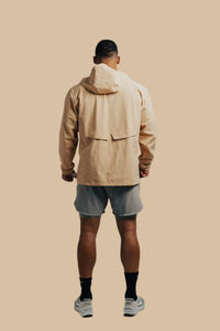 Back view of the King's Gold Stealth jacket and grey shorts