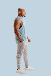 Air Force Blue sleeveless gym shirt by BodCraft, showing the scalloped hem detail