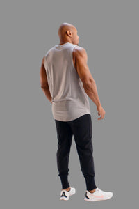 Ghost Grey sleeveless gym shirt by BodCraft, showing the scalloped hem detail