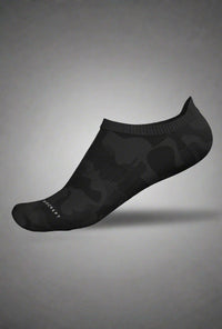 Single black camo no-show sock floating on a grey background
